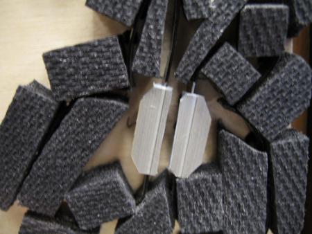 image: Moth steel rule die with plastic-back matrix applied (note mitered corners) 